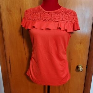Flattering Lazer cut orange top